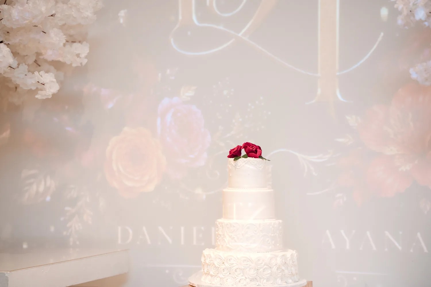 Cake with custom monogram projection at Eden Events, Houston, TX