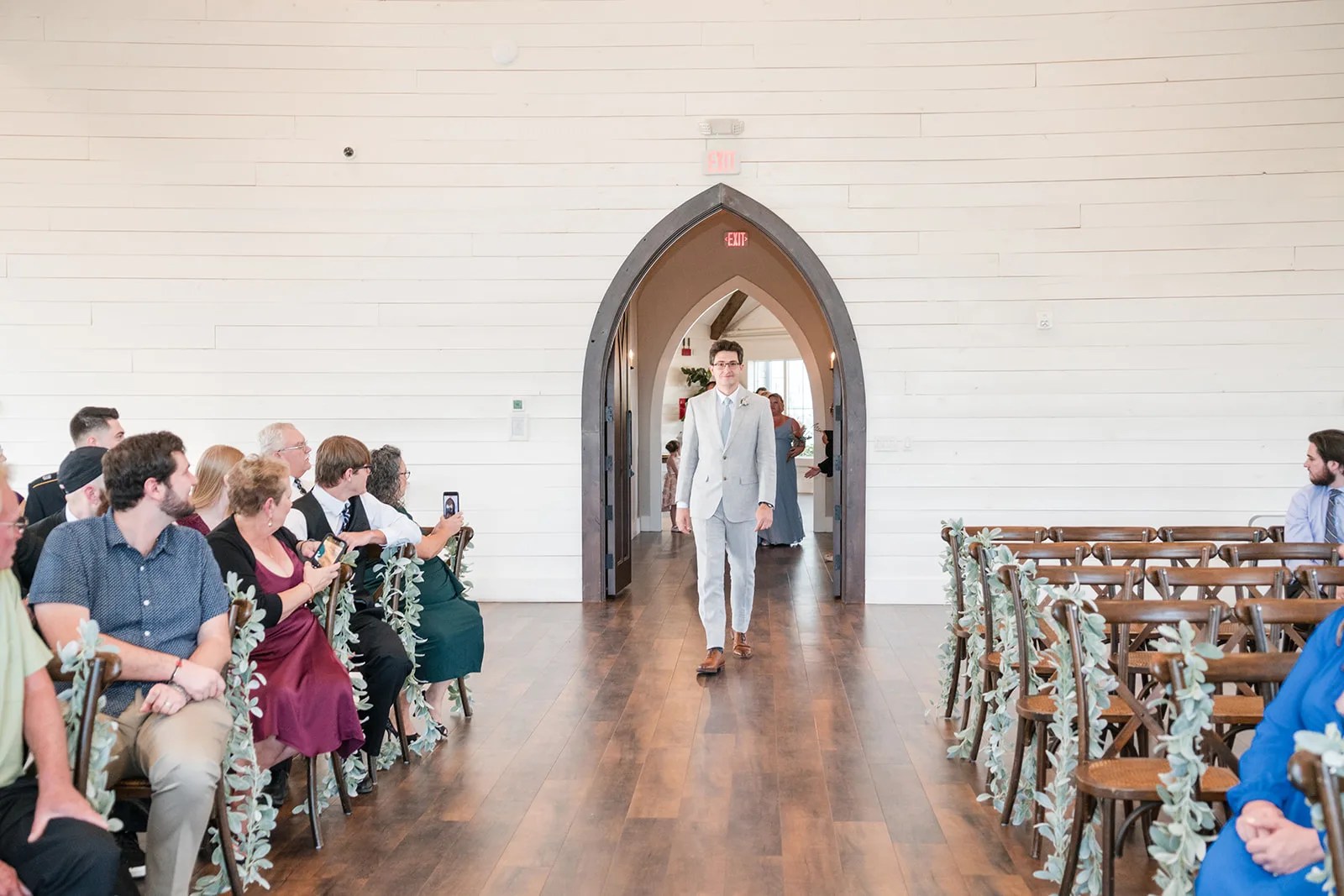 Chapel aisle and guests at HighPointe Estate in Liberty Hill, TX