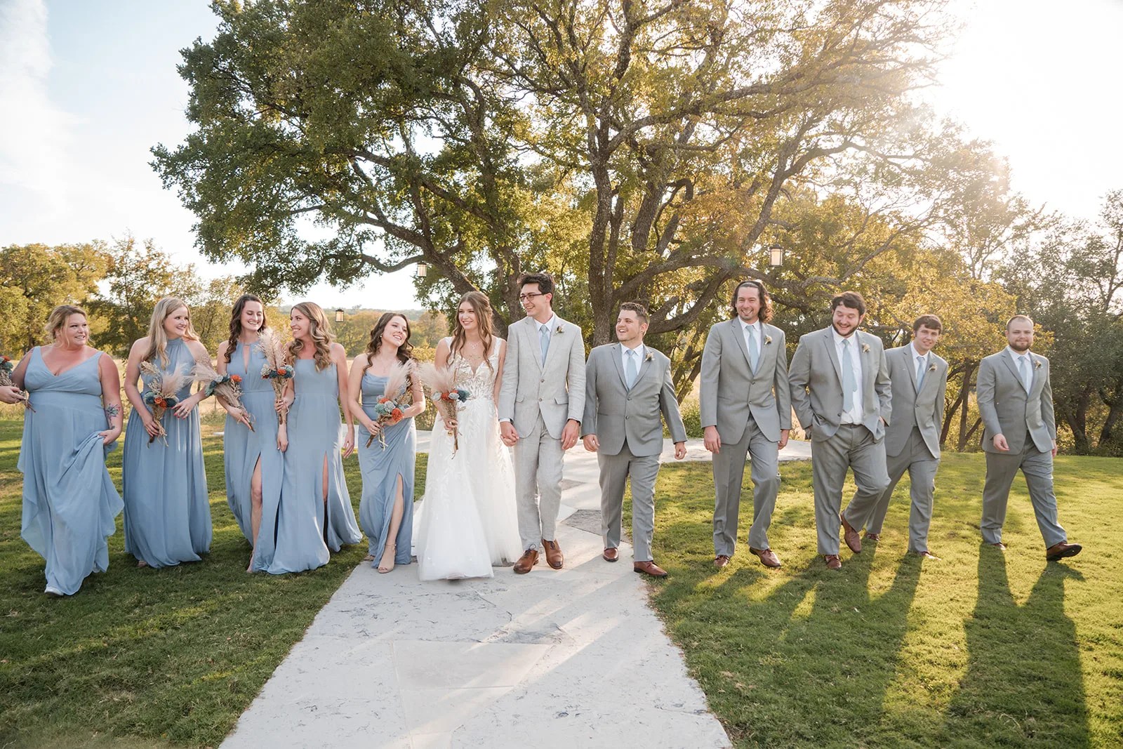 Wedding party on the estate path at HighPointe Estate in Liberty Hill, TX