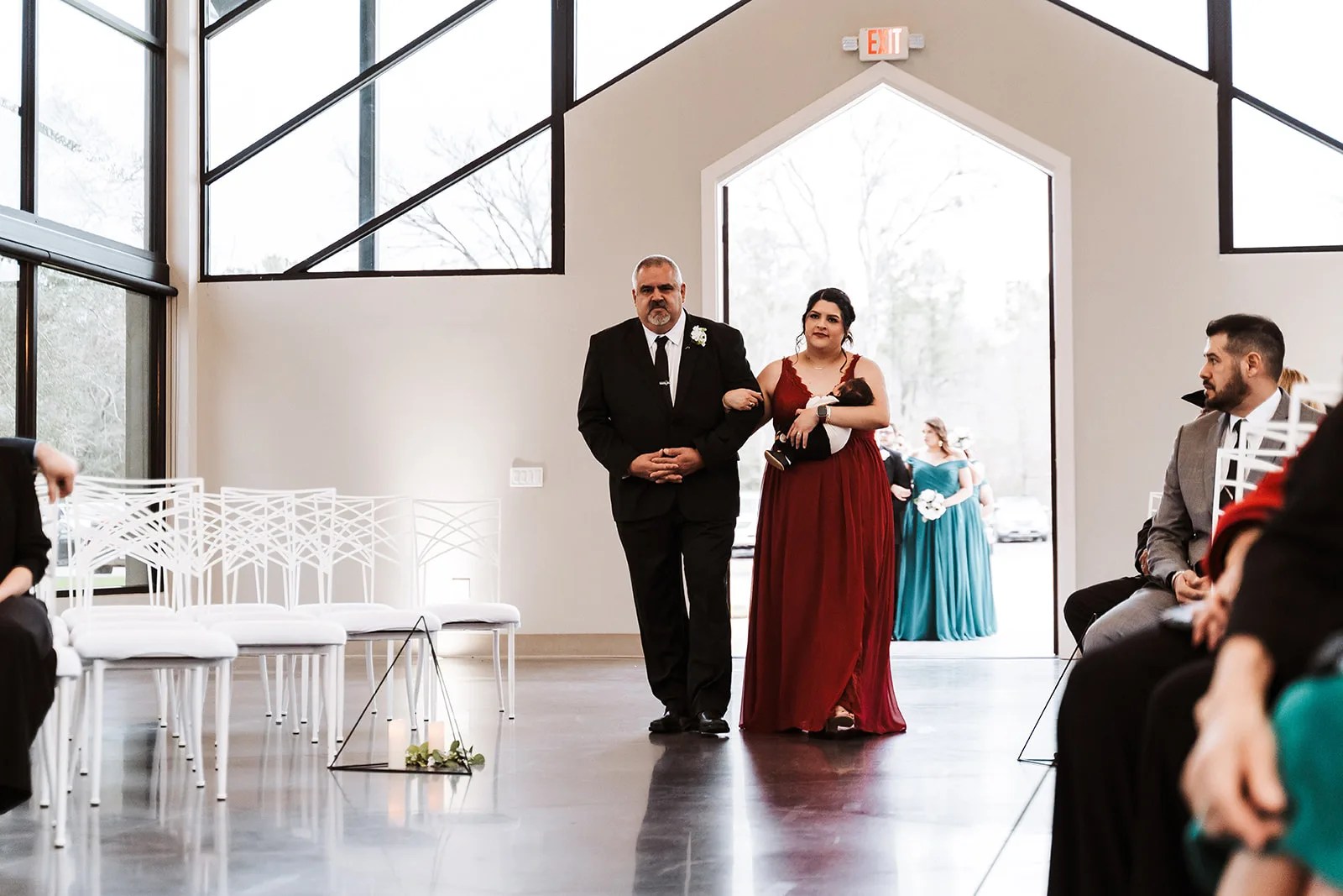 Wedding ceremony in the glass chapel at Jennings Trace in Montgomery, TX