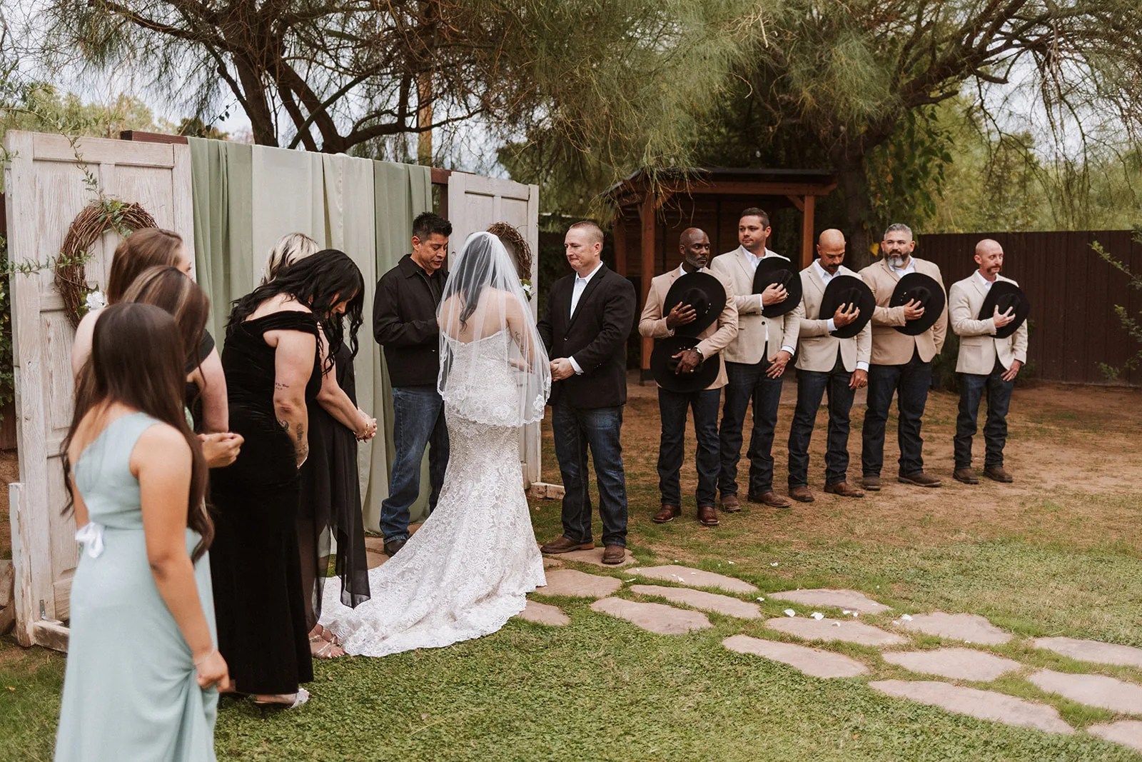 Wedding ceremony on the lawn at Kelly's Cottage at Kelly's Cottage, Tolleson, AZ