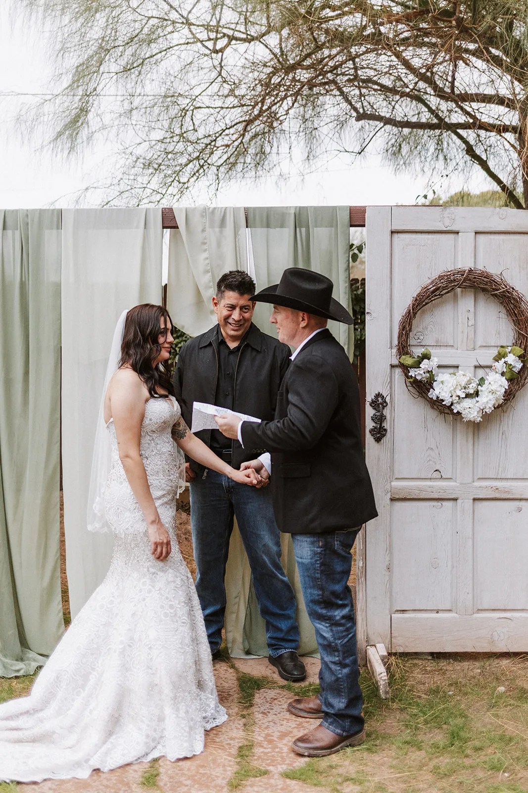 Ceremony at the cottage doors at Kelly's Cottage at Kelly's Cottage, Tolleson, AZ