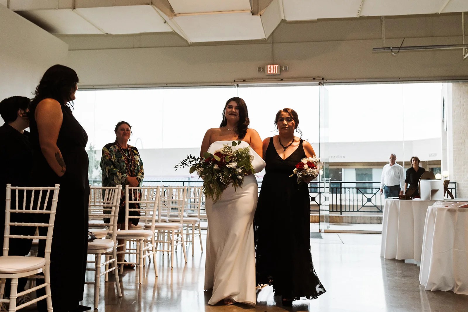 Level Two Events wedding venue in Dallas, TX, draped event space with chiavari chairs