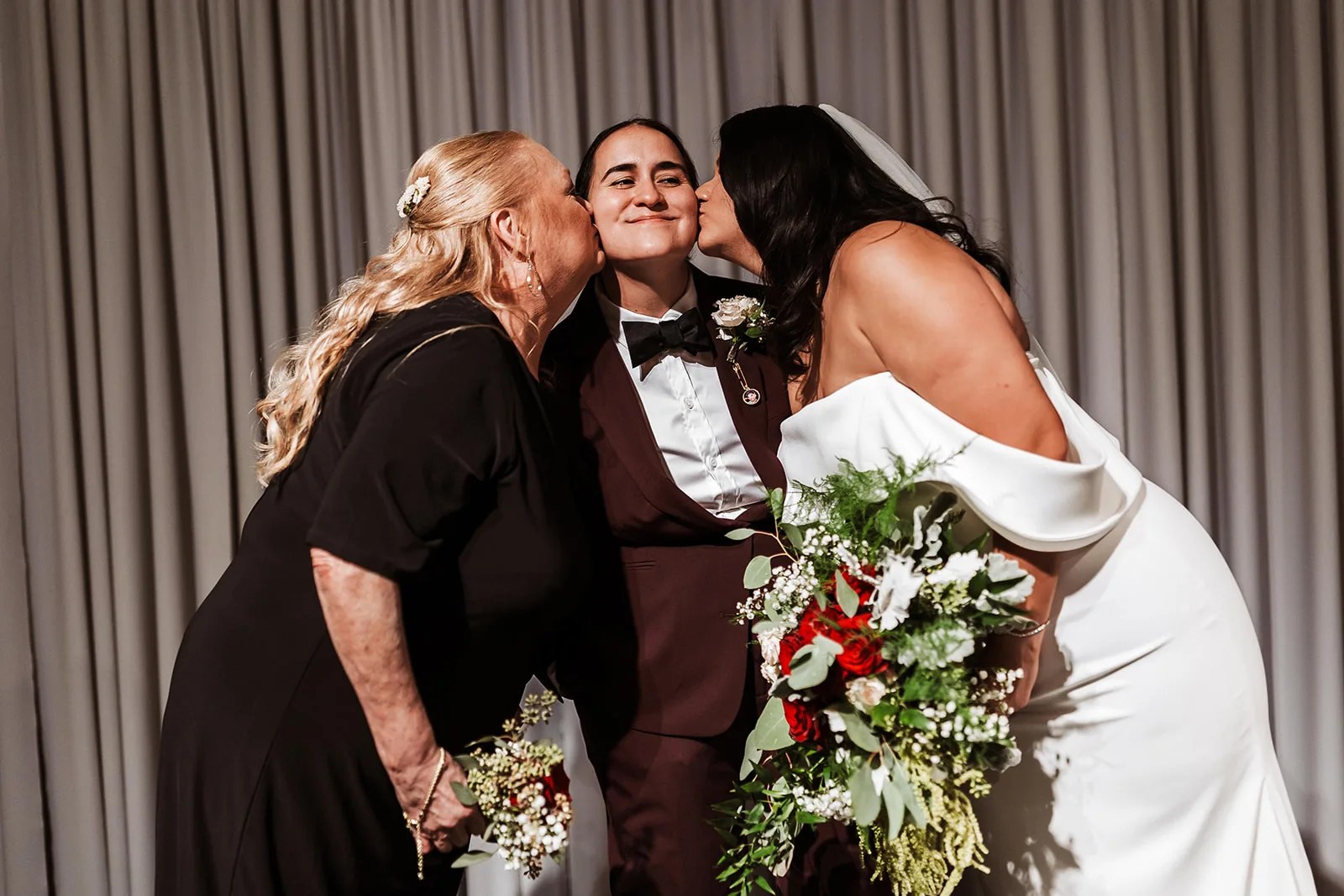 Couple with the wedding party at Level Two Events in Dallas, TX