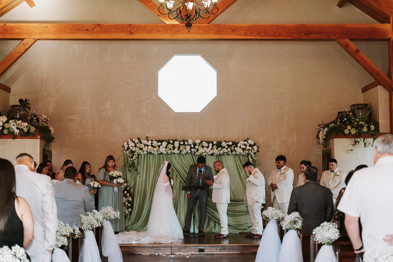 Ceremony under the wood beams at Lindsay Lakes, Cypress, TX