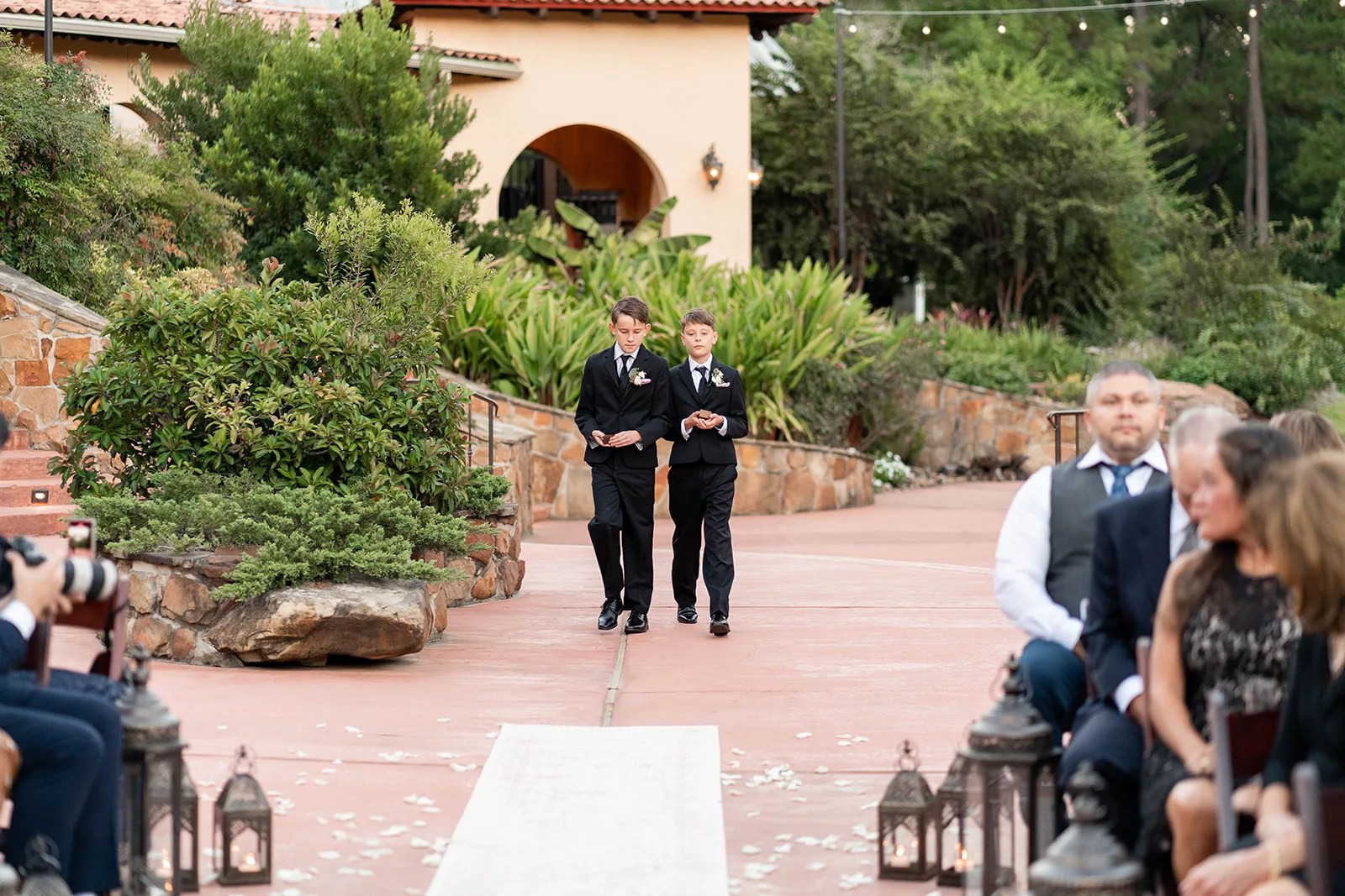 Ceremony aisle in the courtyard at Madera Estates in Conroe, TX