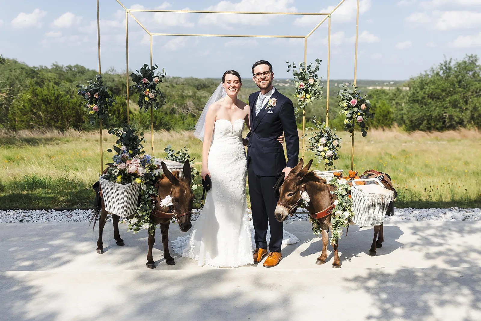 Ceremony arch with the Hill Country behind at Mae's Ridge at Mae's Ridge, Johnson City, TX