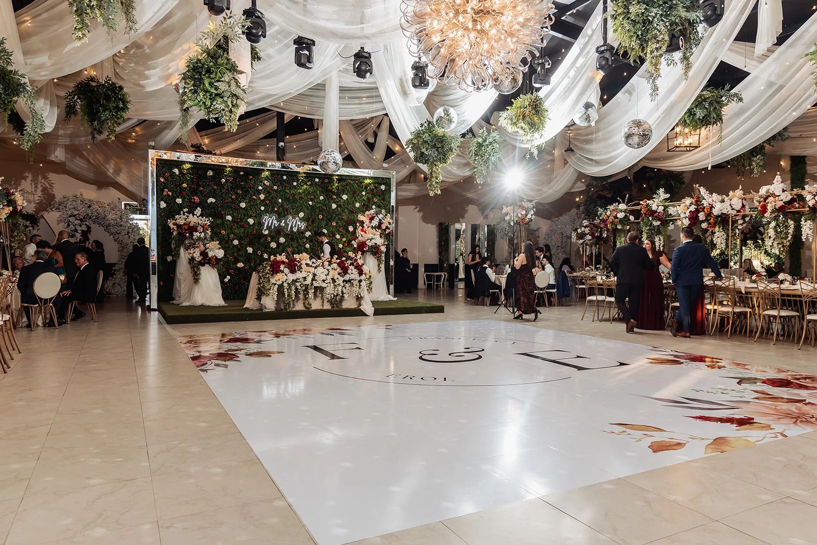Draped ceiling and monogram dance floor at Monarca Event Center in Edinburg, Texas