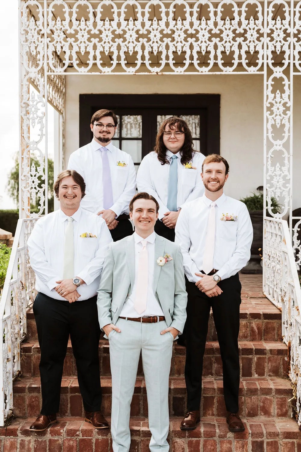 Groomsmen outside the manor at Nardini Manor, Arizona