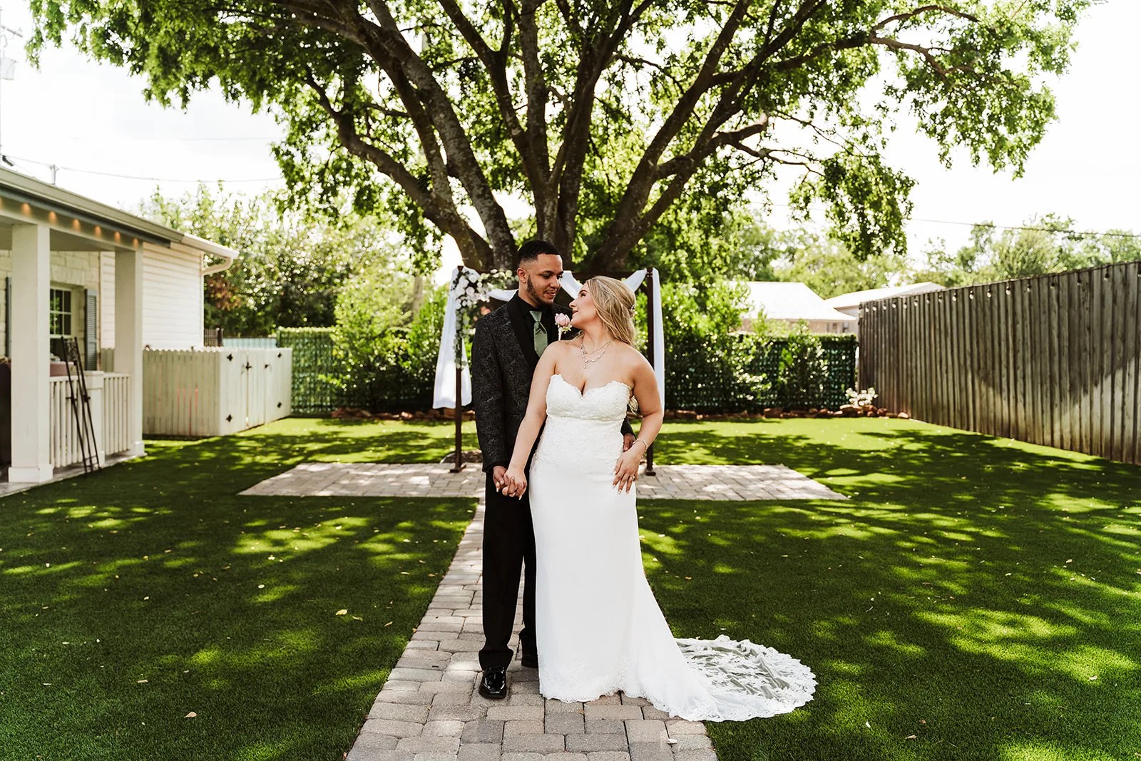 Bride beneath the draped oak at Owen House, Round Rock, TX