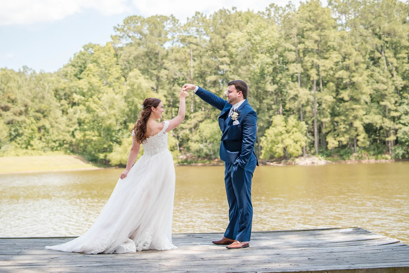 Bride by the lake at Pine Lake Ranch in Montgomery, TX