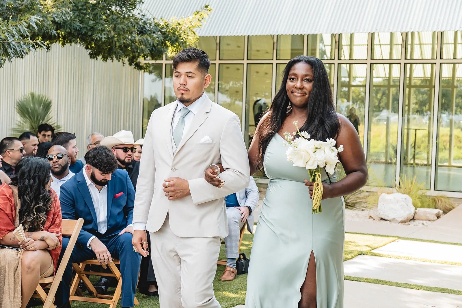 Wedding ceremony in the glass walled Gallery at Prospect House at Prospect House, Dripping Springs, TX