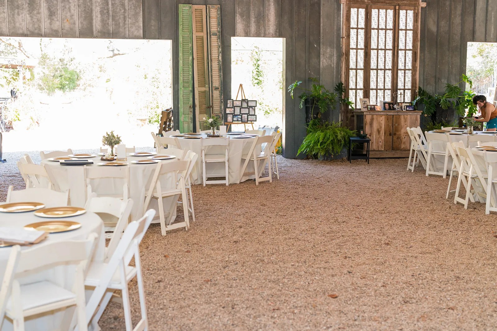 The covered patio set with tables at Rambling Rose Ranch, Austin, TX