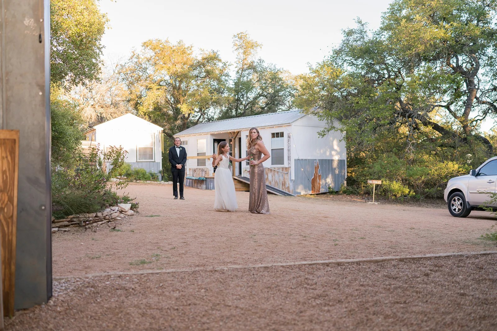 The farmhouse and drive at Rambling Rose Ranch, Austin, TX