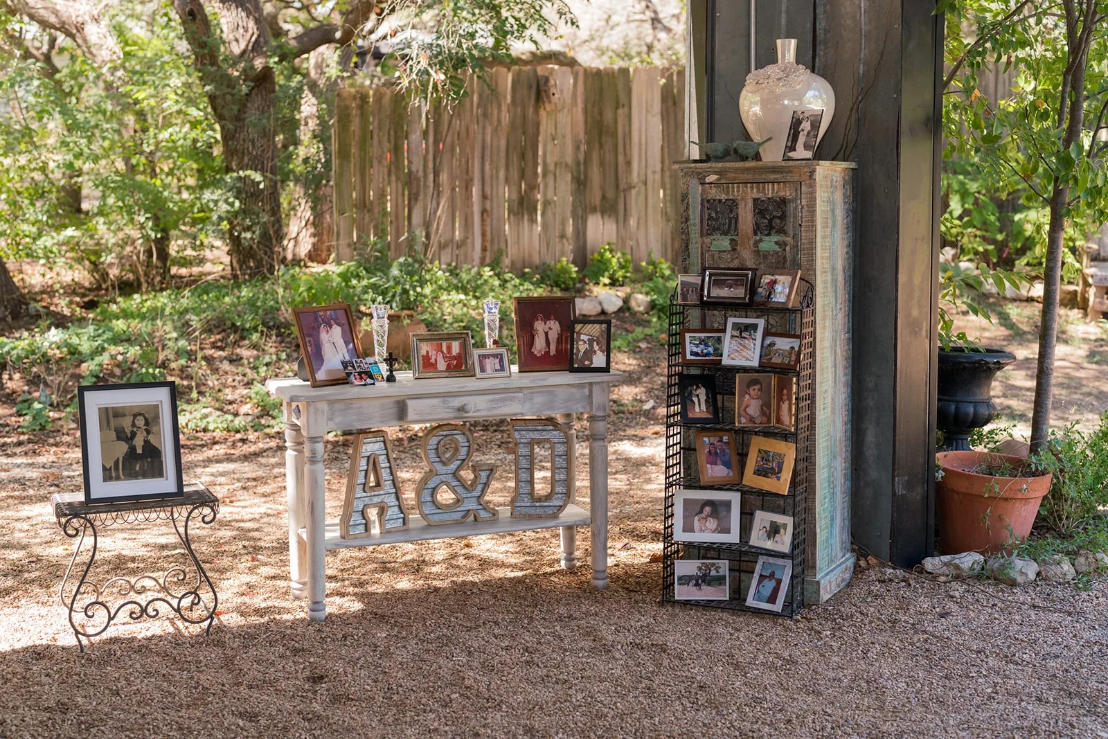 A wall of framed photographs at Rambling Rose Ranch, Austin, TX