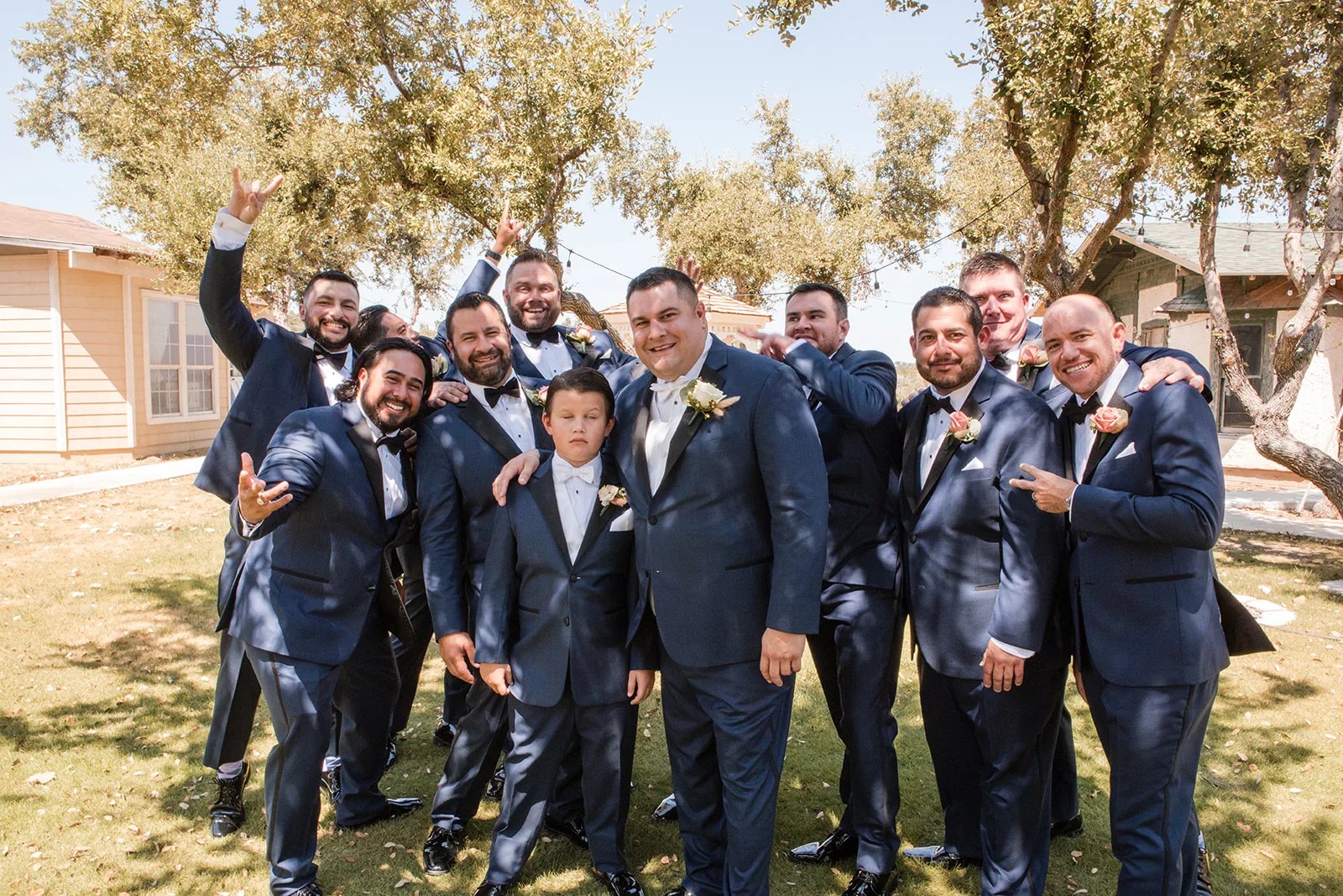 Groomsmen on the main street at Star Hill Ranch in Austin, TX