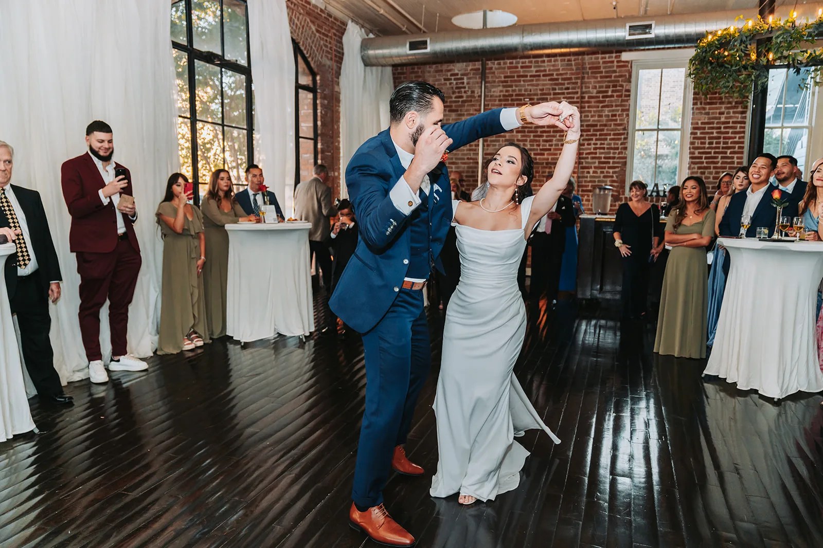Guests dancing at a Station 3 wedding reception in Houston, TX