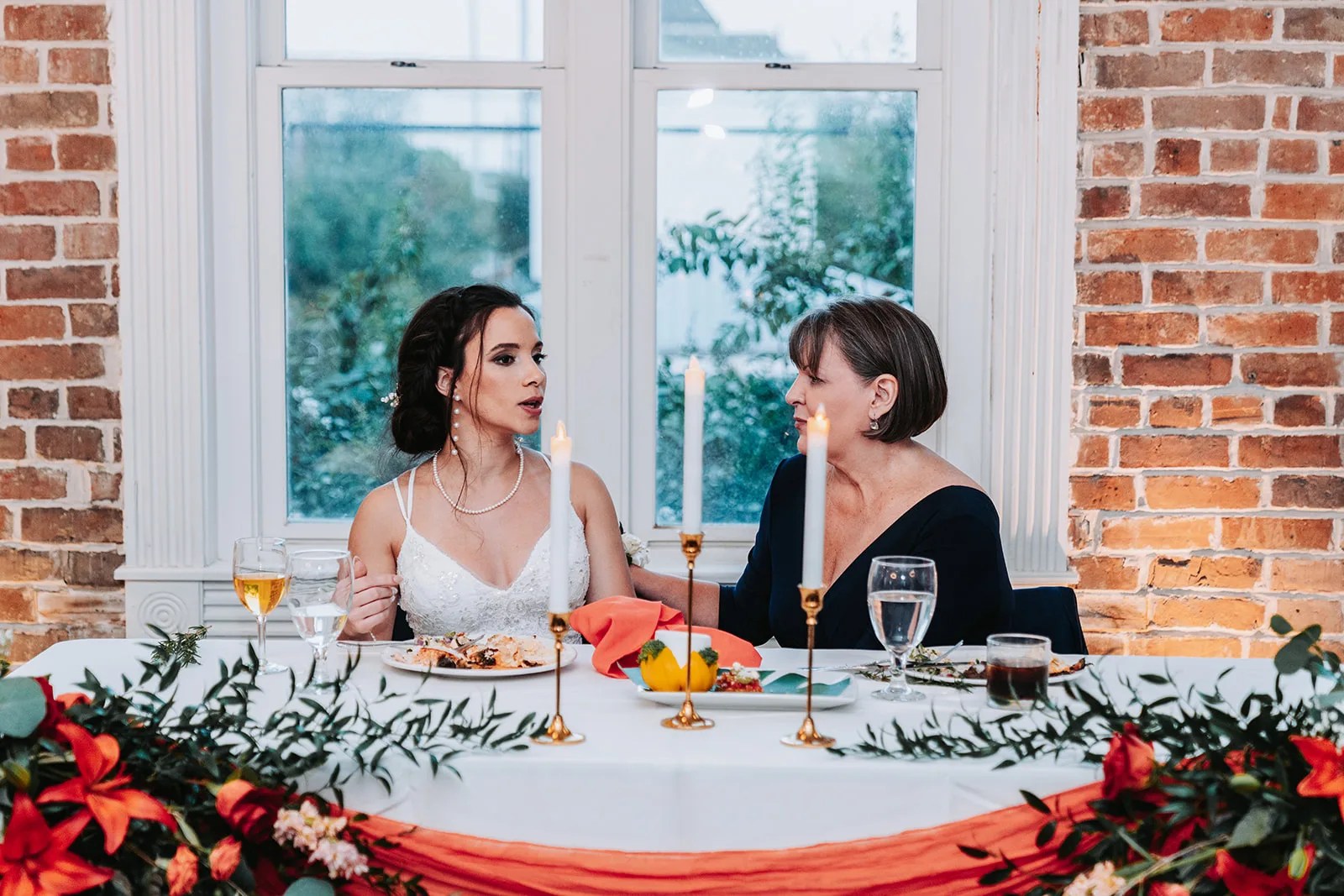 Bride and groom at the sweetheart table at Station 3 in Houston, TX