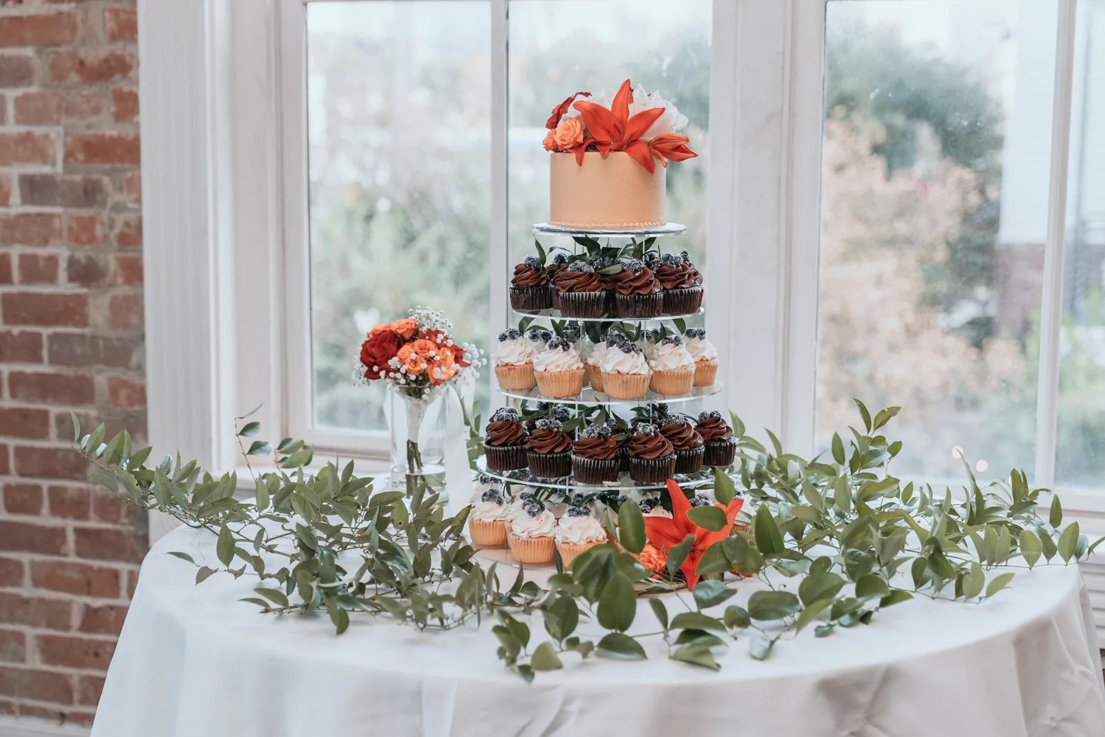 Wedding cake with greenery at Station 3 in Houston, TX