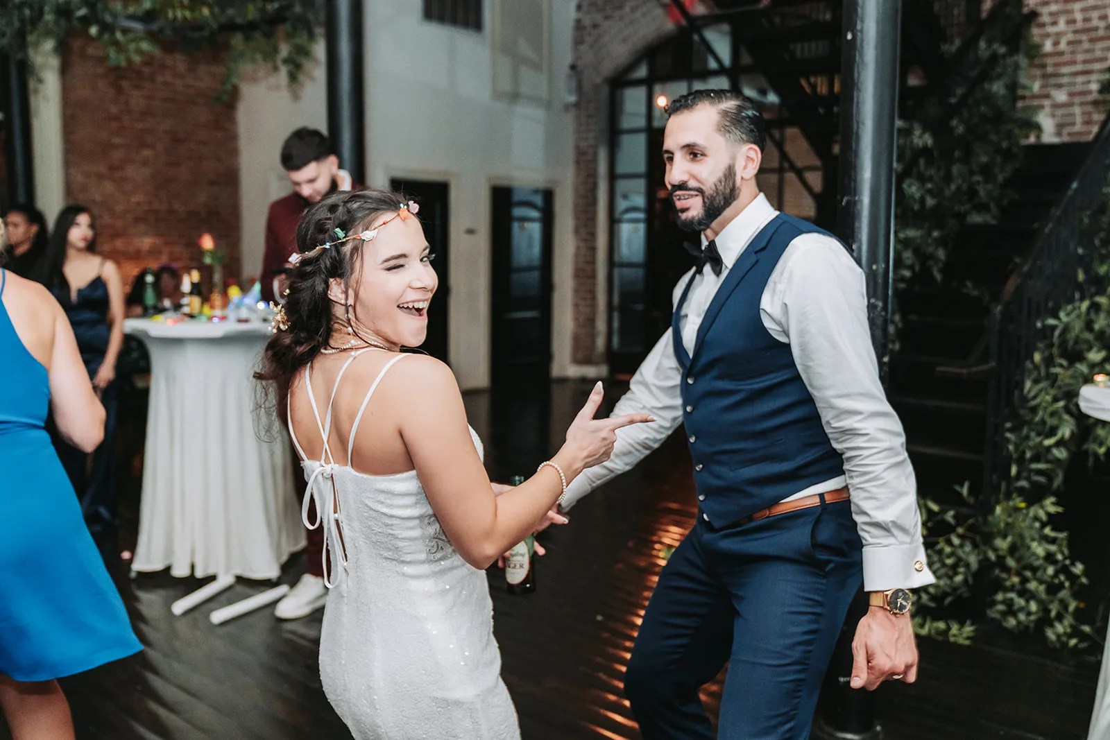 Dancing under the lights at a Station 3 wedding in Houston, TX