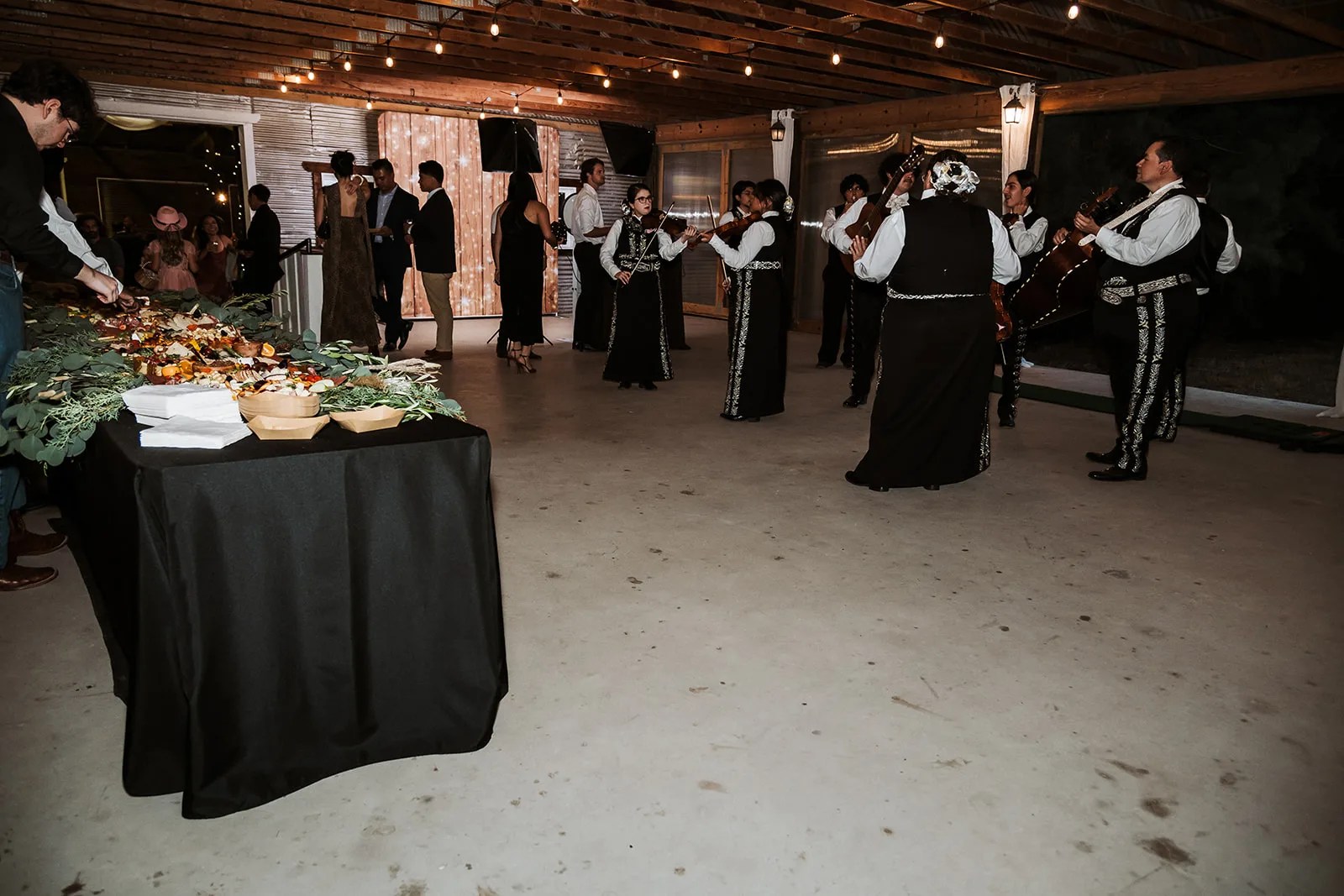 Wedding reception inside the restored barn at Strawberry Pines at Strawberry Pines, Poteet, TX