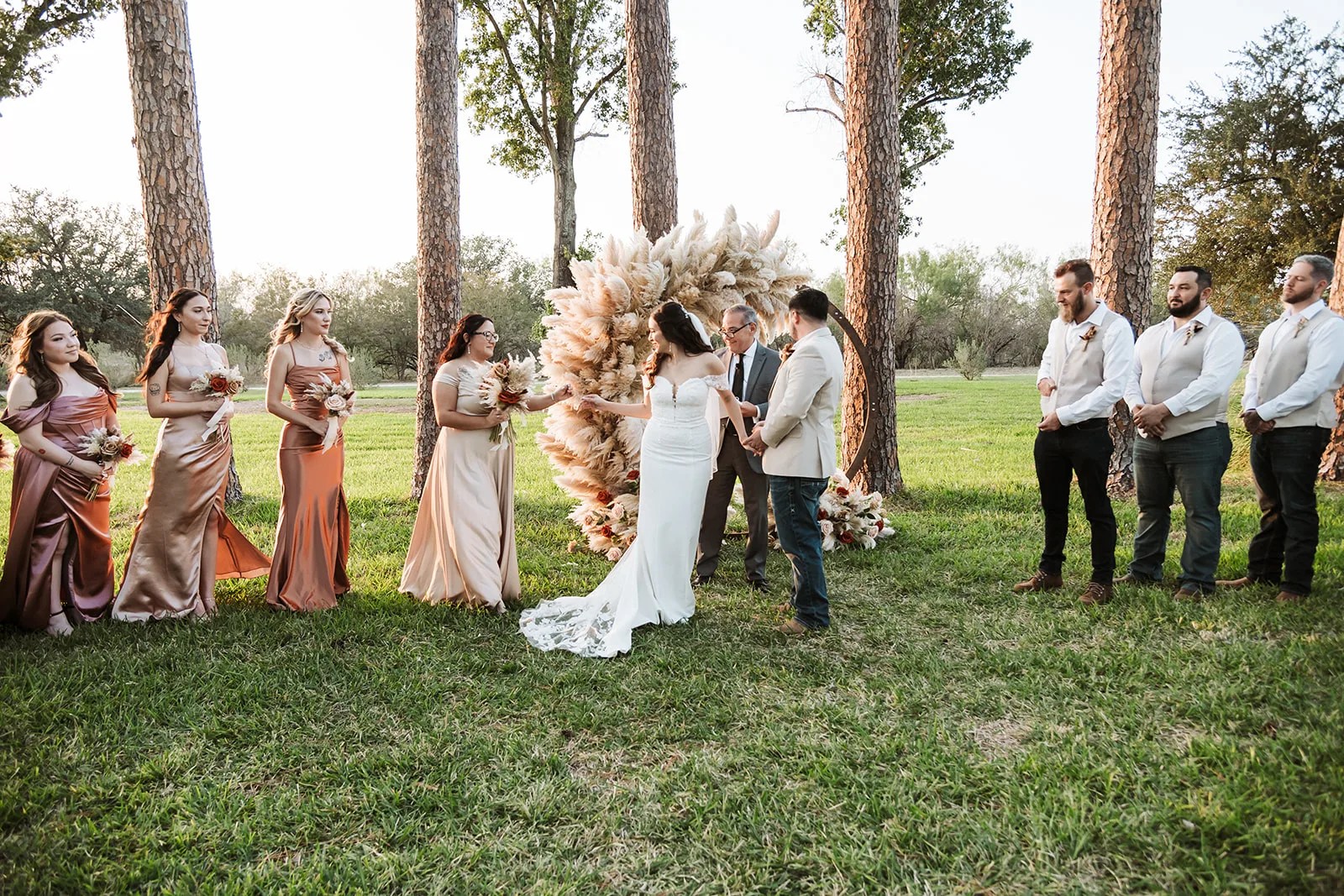 Wedding party under the pines at Strawberry Pines at Strawberry Pines, Poteet, TX