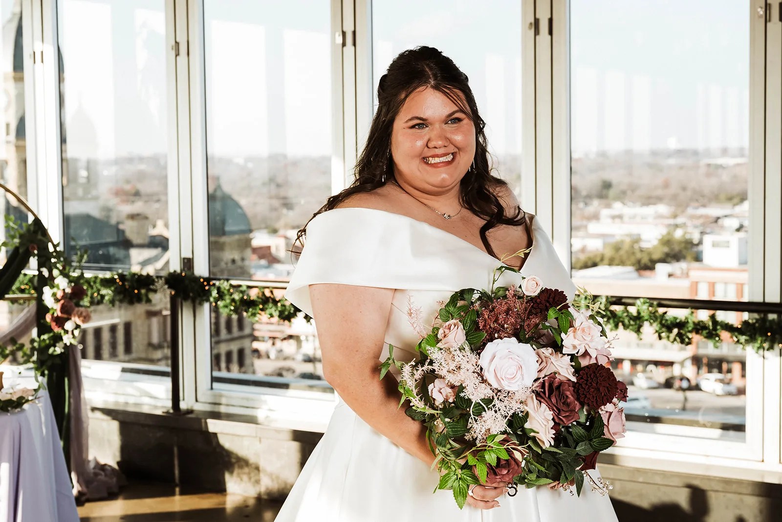 Bride at the floor to ceiling windows at Sunago Bell at Sunago Bell, Denton, TX