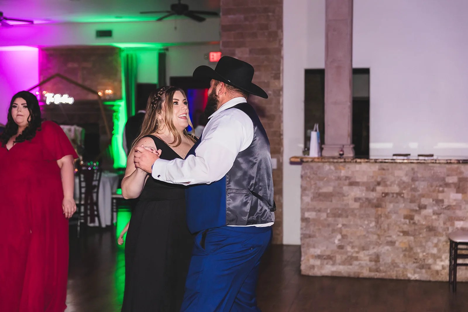 Dance floor with green uplighting at Superstition Manor at Superstition Manor, Mesa, AZ