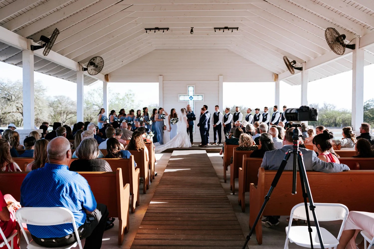 Ceremony inside the chapel at Teaghlach Meadows in Yorktown, Texas
