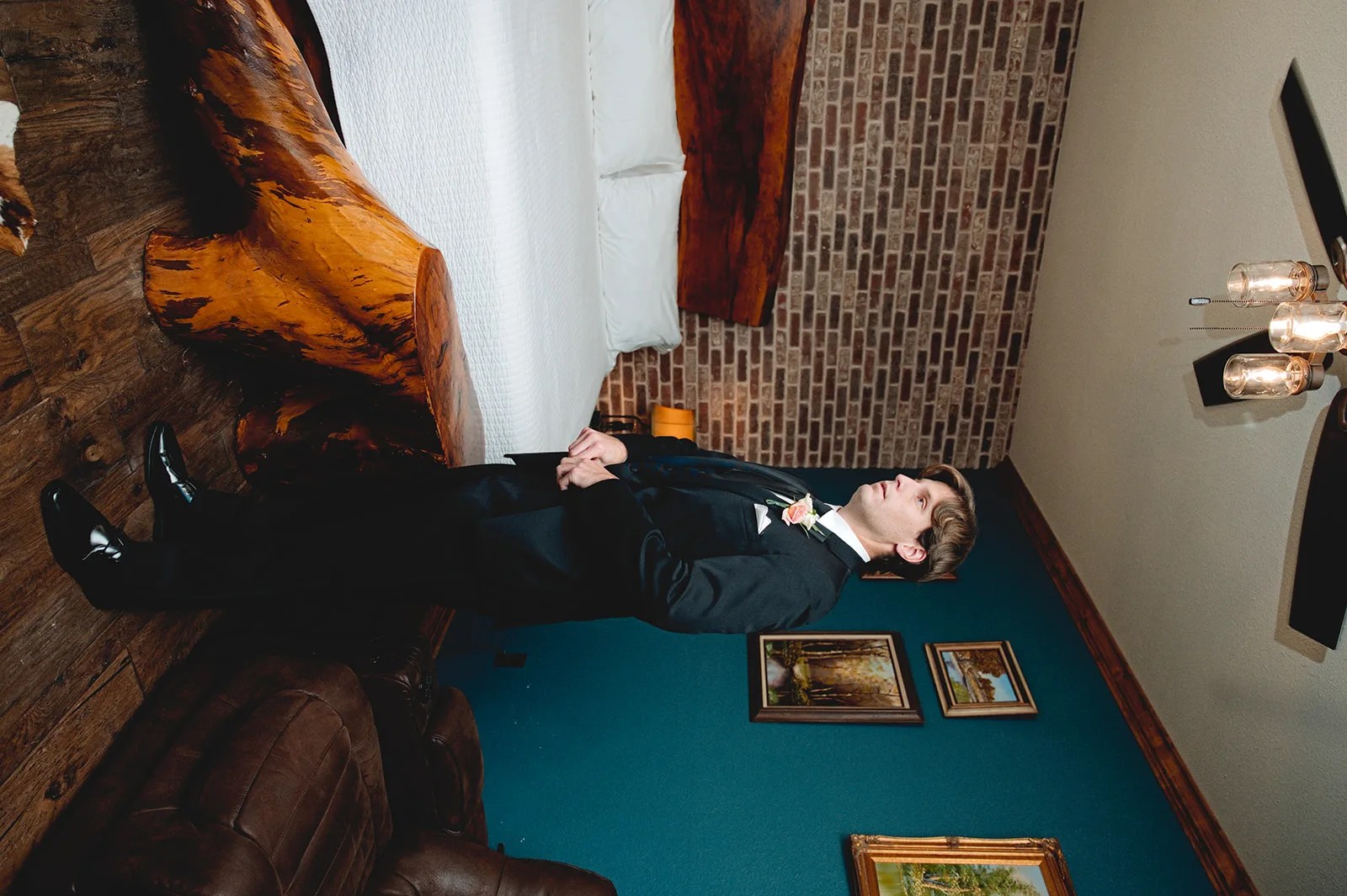 Groom in the period sitting room at The Belamour, Houston, TX