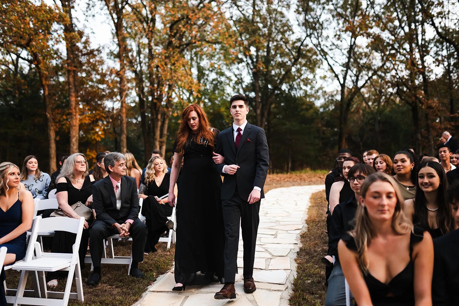Guests along the stone aisle at The Black Oak, Sulphur Springs, TX