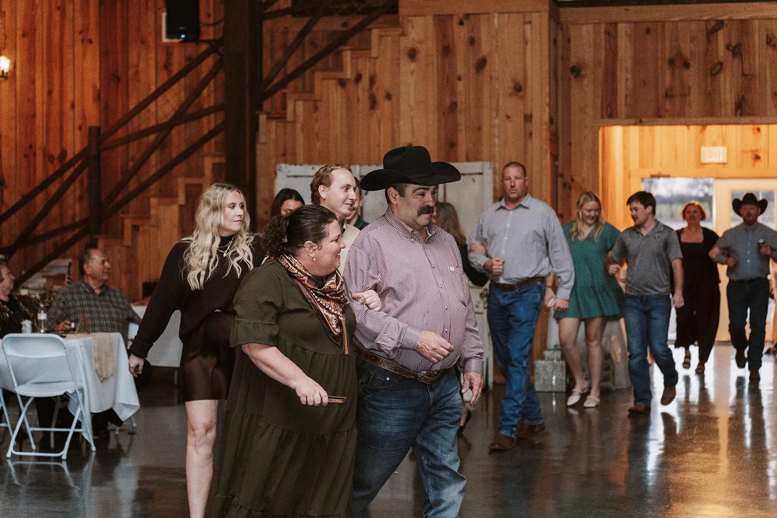 Guests dancing at a wedding reception at The County Line in Abbott, TX