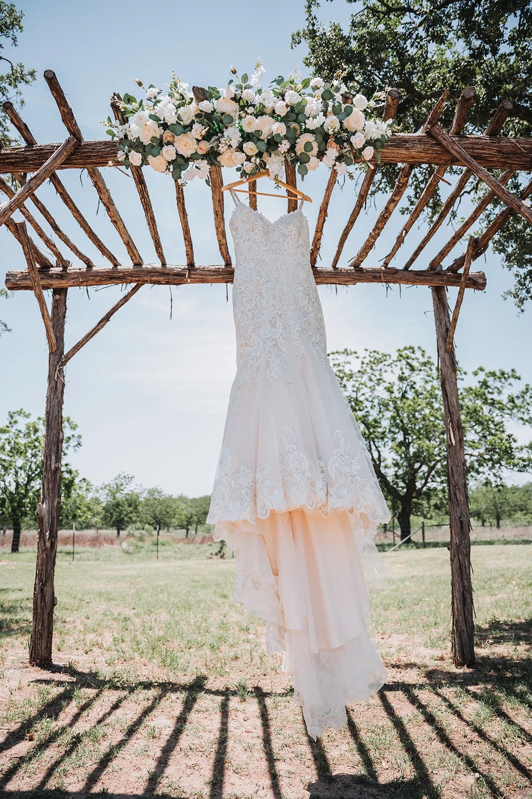 The arbor ceremony site at The Ginger Ranch, Fredericksburg, TX