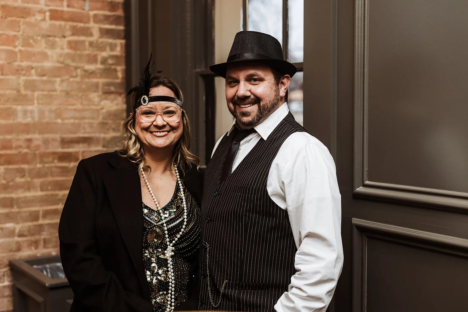 Bride and groom portrait against the historic brick at The Graily at The Graily, Waxahachie, TX