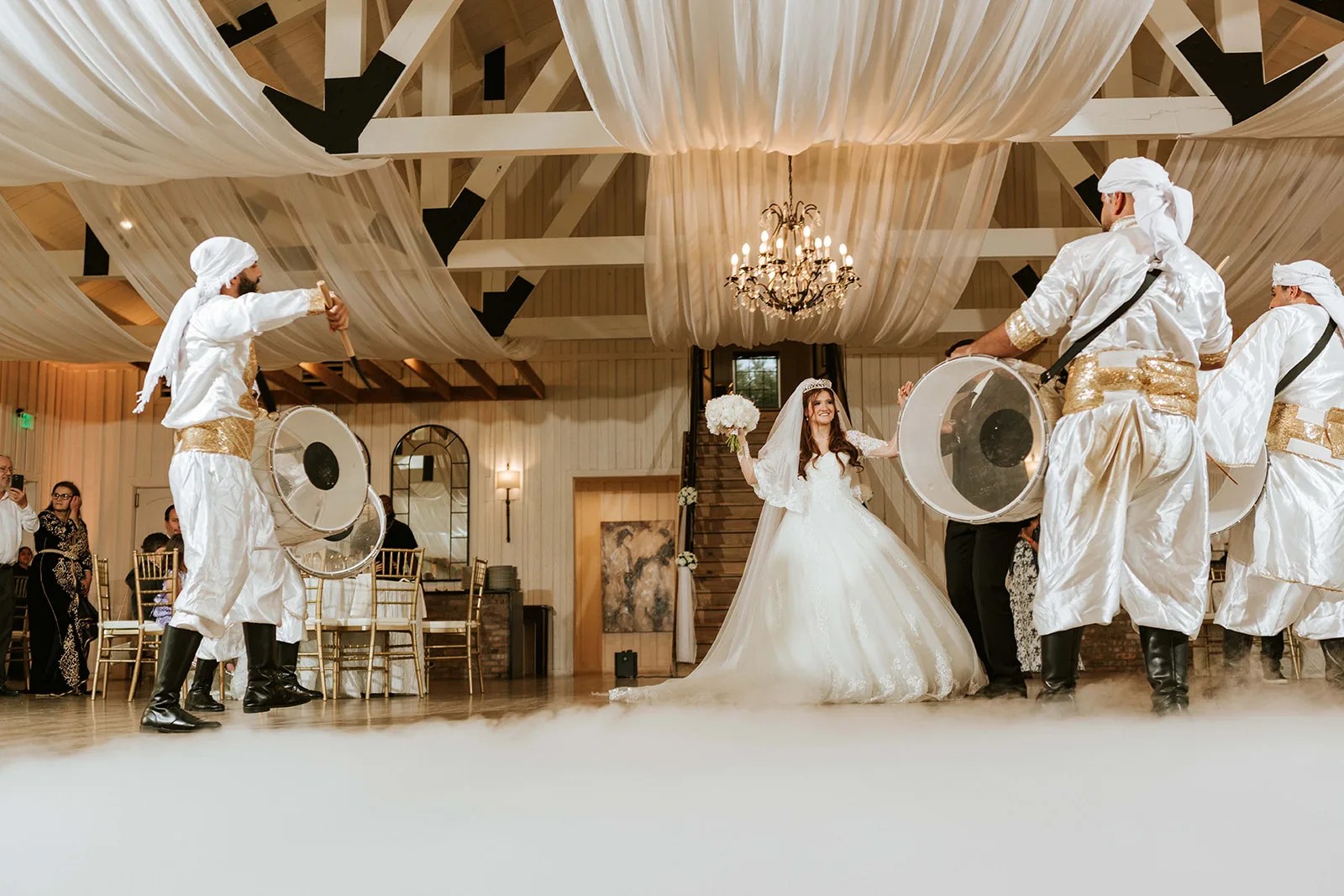 The Milestone Georgetown wedding venue in Georgetown, TX, shiplap reception hall with chandeliers