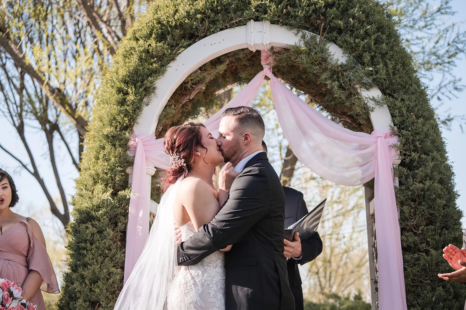 Ceremony beneath the hedge arch at The Windmill House, Chino Valley, AZ
