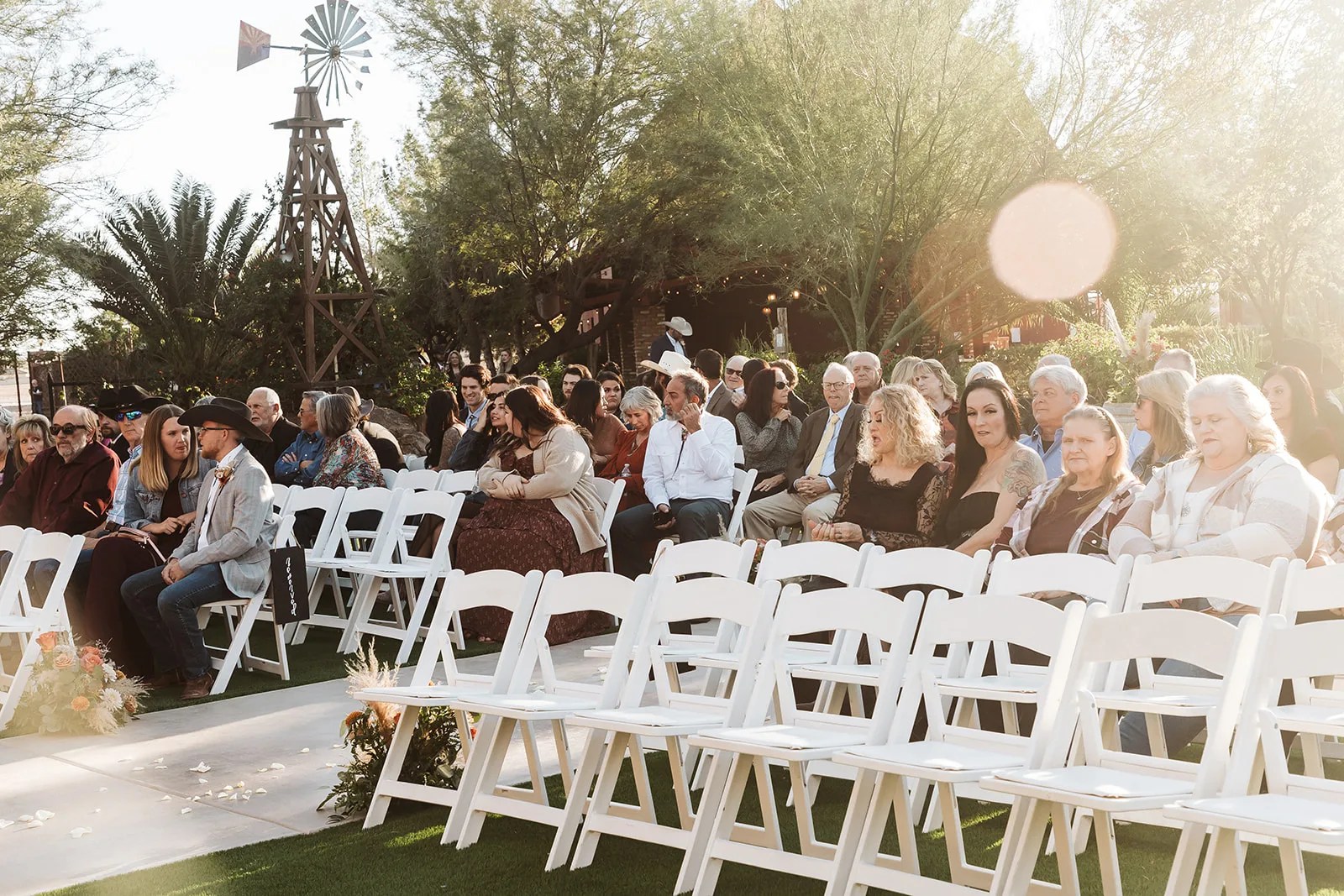 Ceremony chairs set on the lawn at The Windmill Winery, Florence, AZ