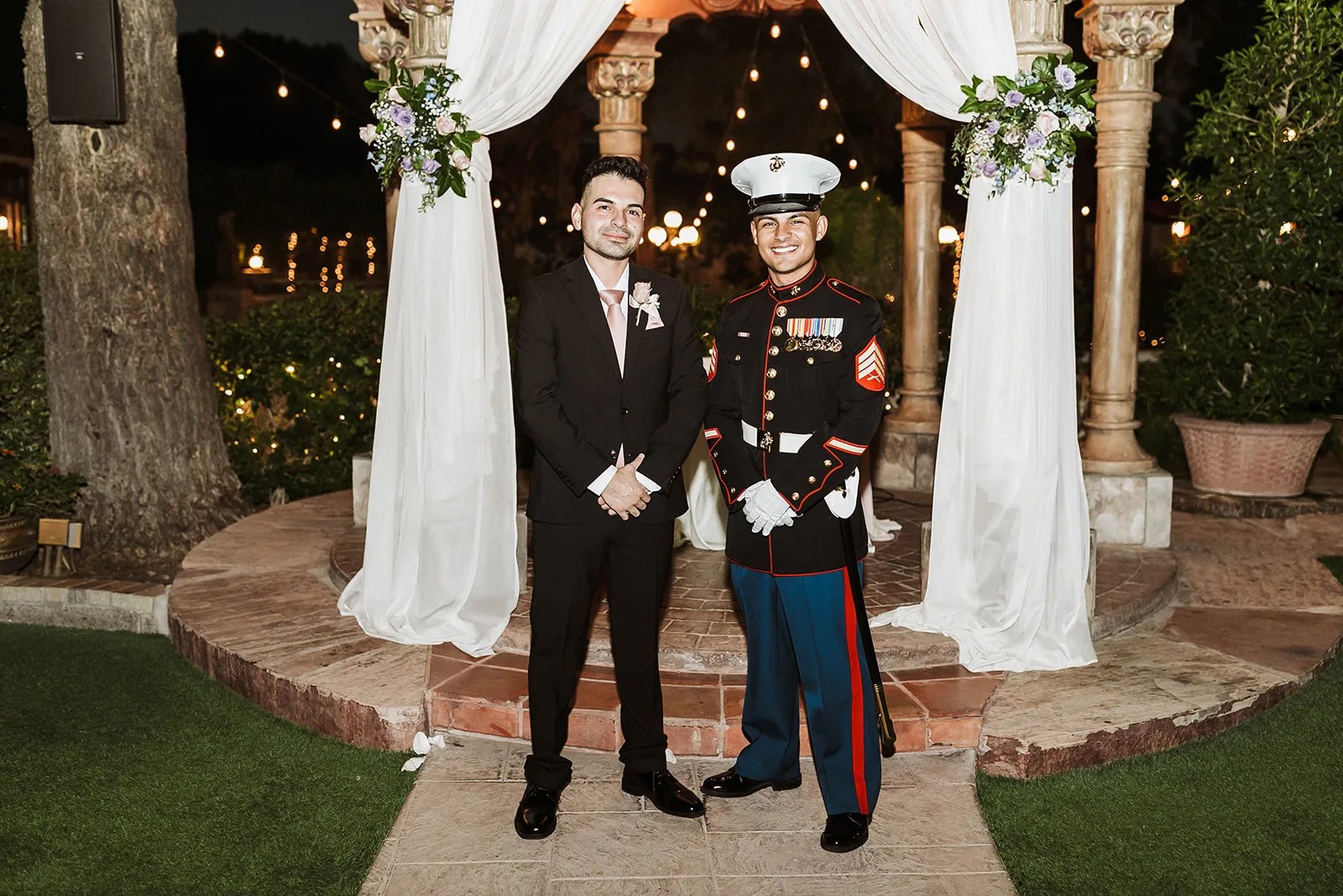 Couple at the ceremony arch at The Wright House, Mesa, AZ