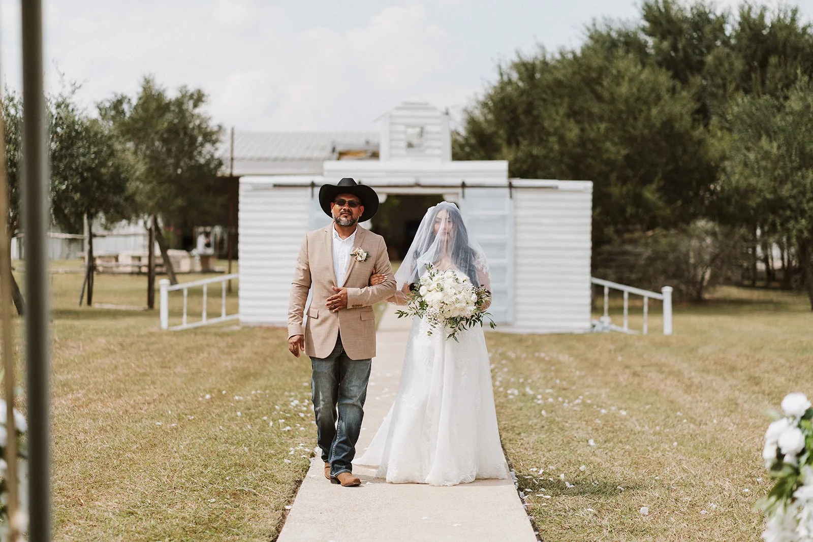 The venue building and lawn at Tin Spur Ranch, Inez, TX