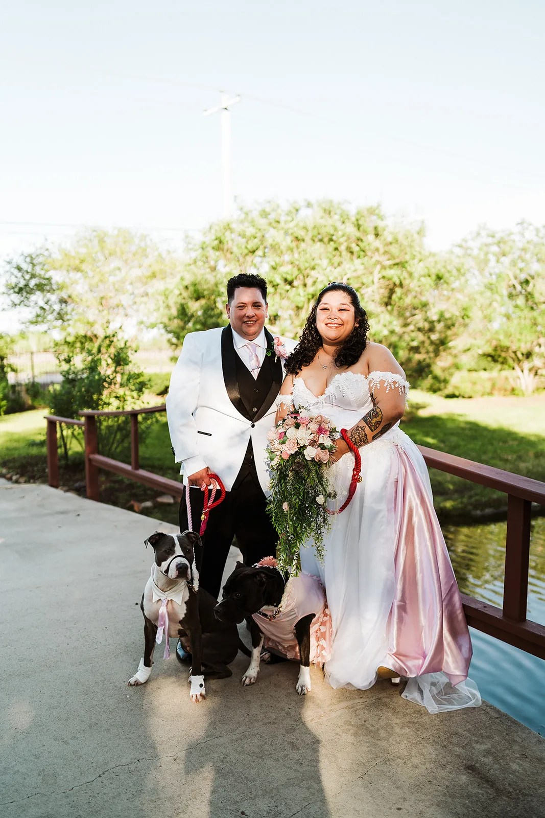 Couple on the lawn at Tuscan Courtyard wedding venue in Dickinson, TX