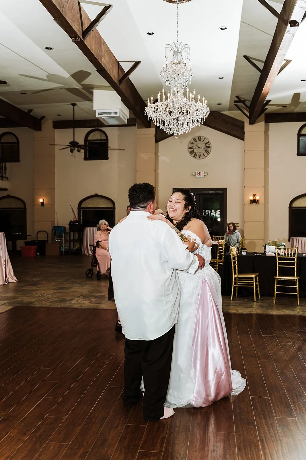Guests dancing in the ballroom at Tuscan Courtyard in Dickinson, TX