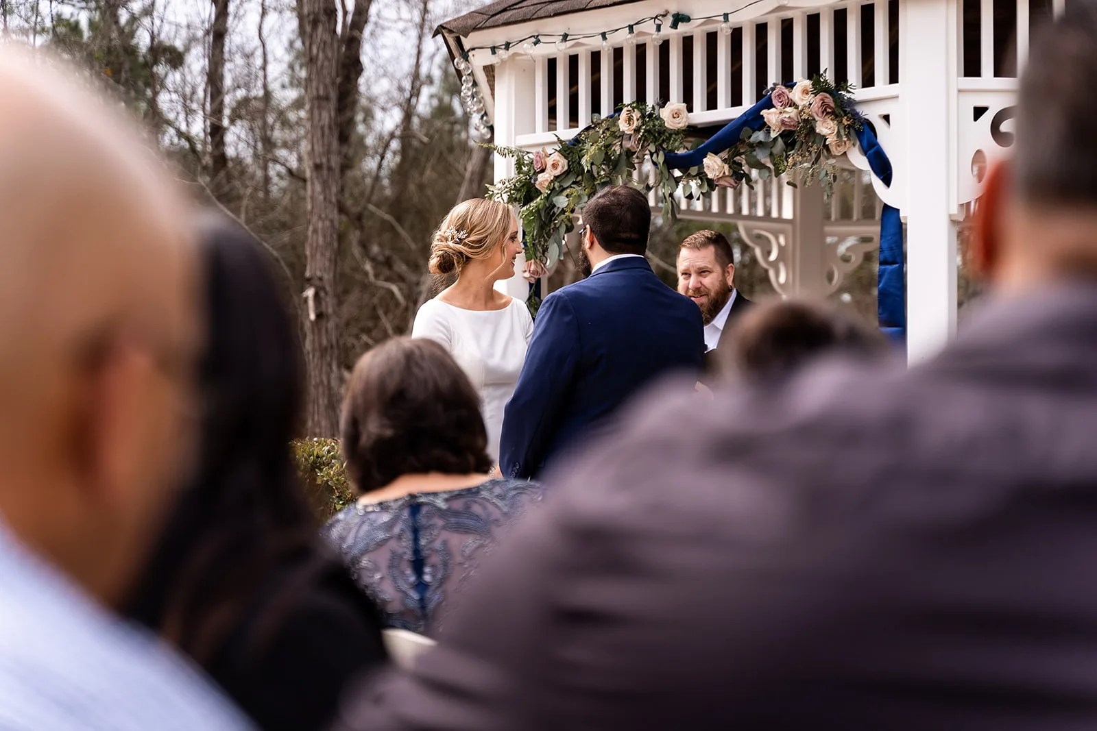 Wedding ceremony from behind at Waverly Manor near Huntsville, TX