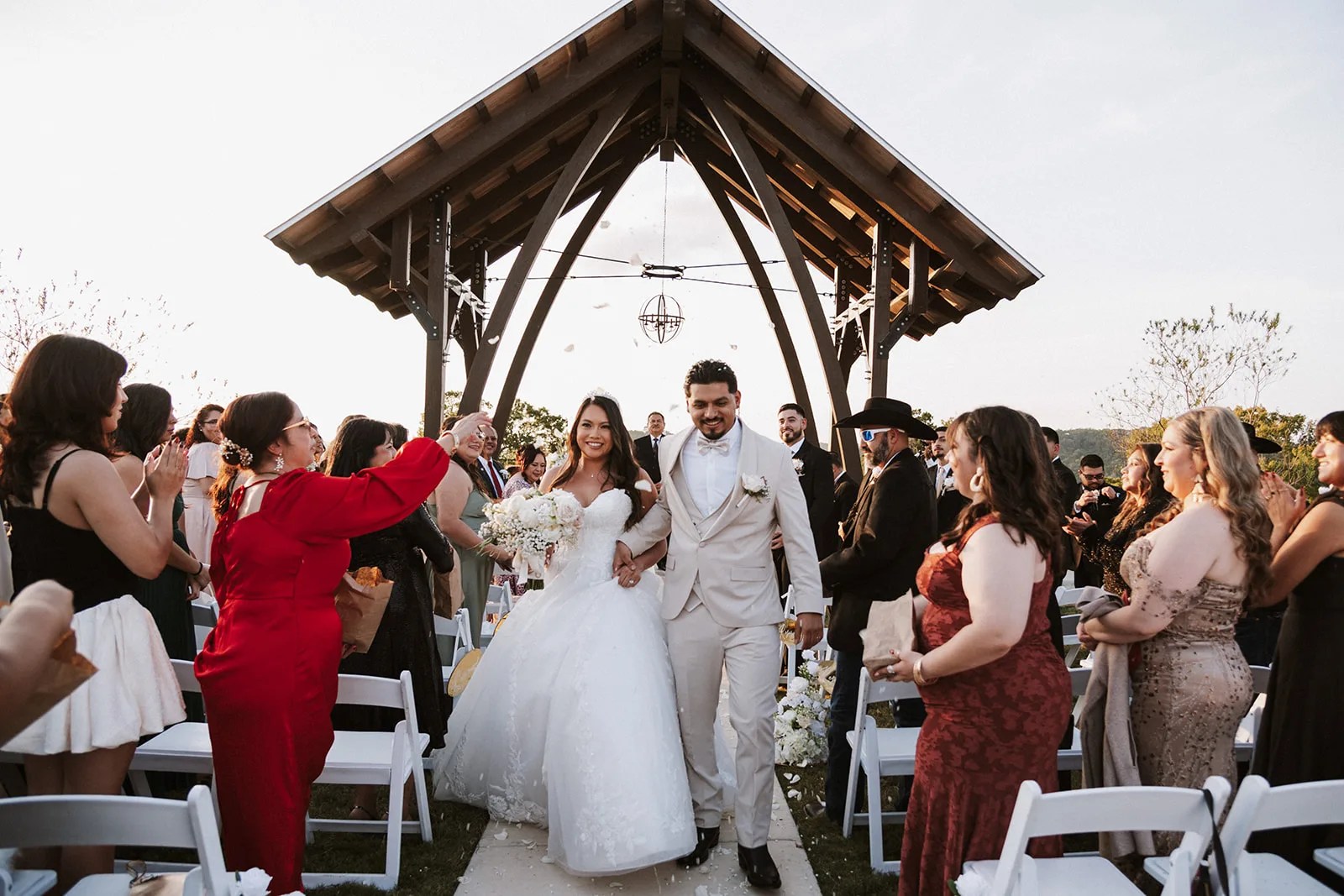 Wedding recessional under the pavilion at Willow Ridge at Willow Ridge, New Braunfels, TX
