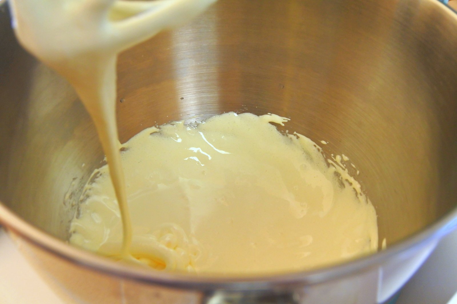 Beat egg yolks and sugar until light in color