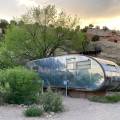 Ojo Caliente vintage trailer among the New Mexico landscape