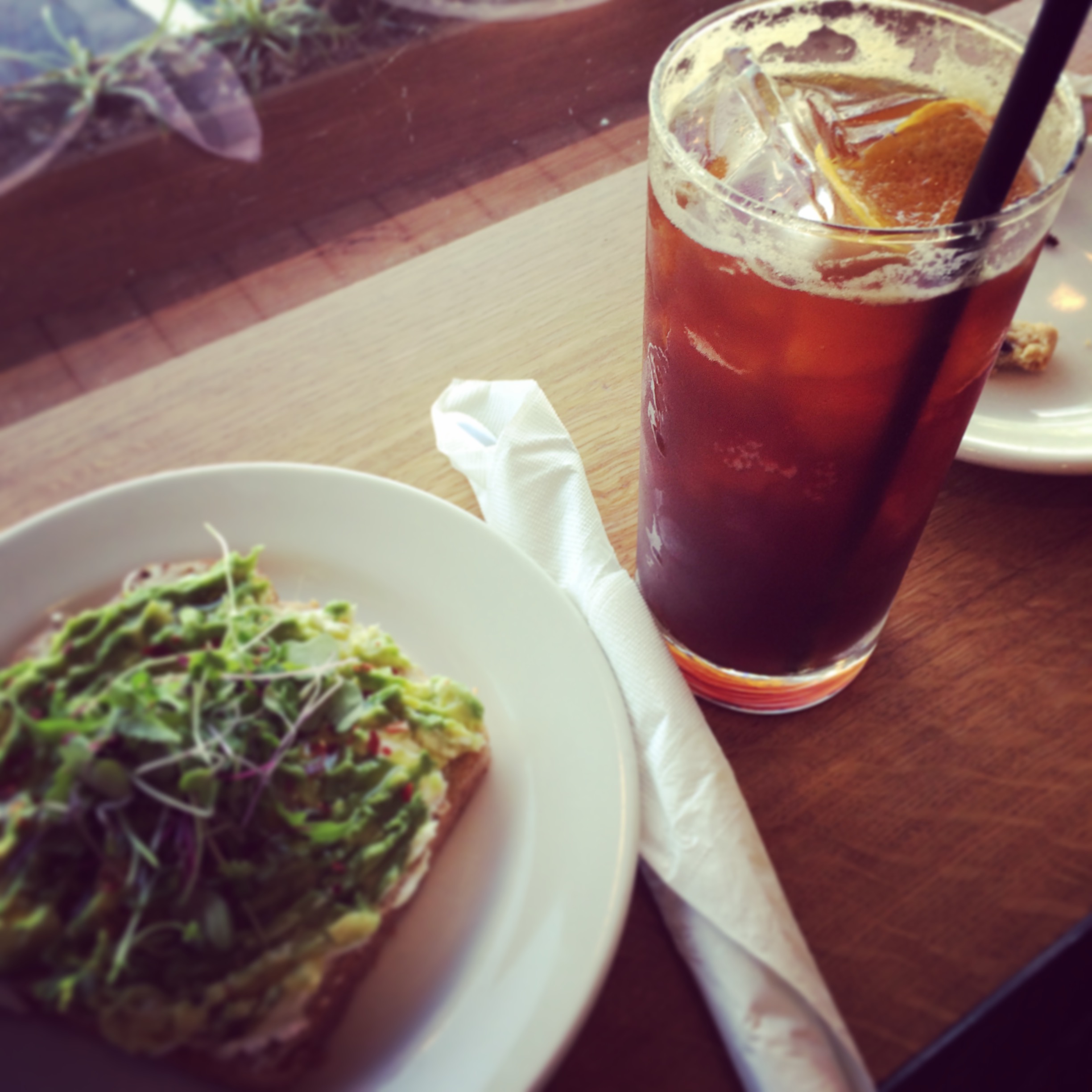 The coffee soda, with a side of avocado toast at Crema.
