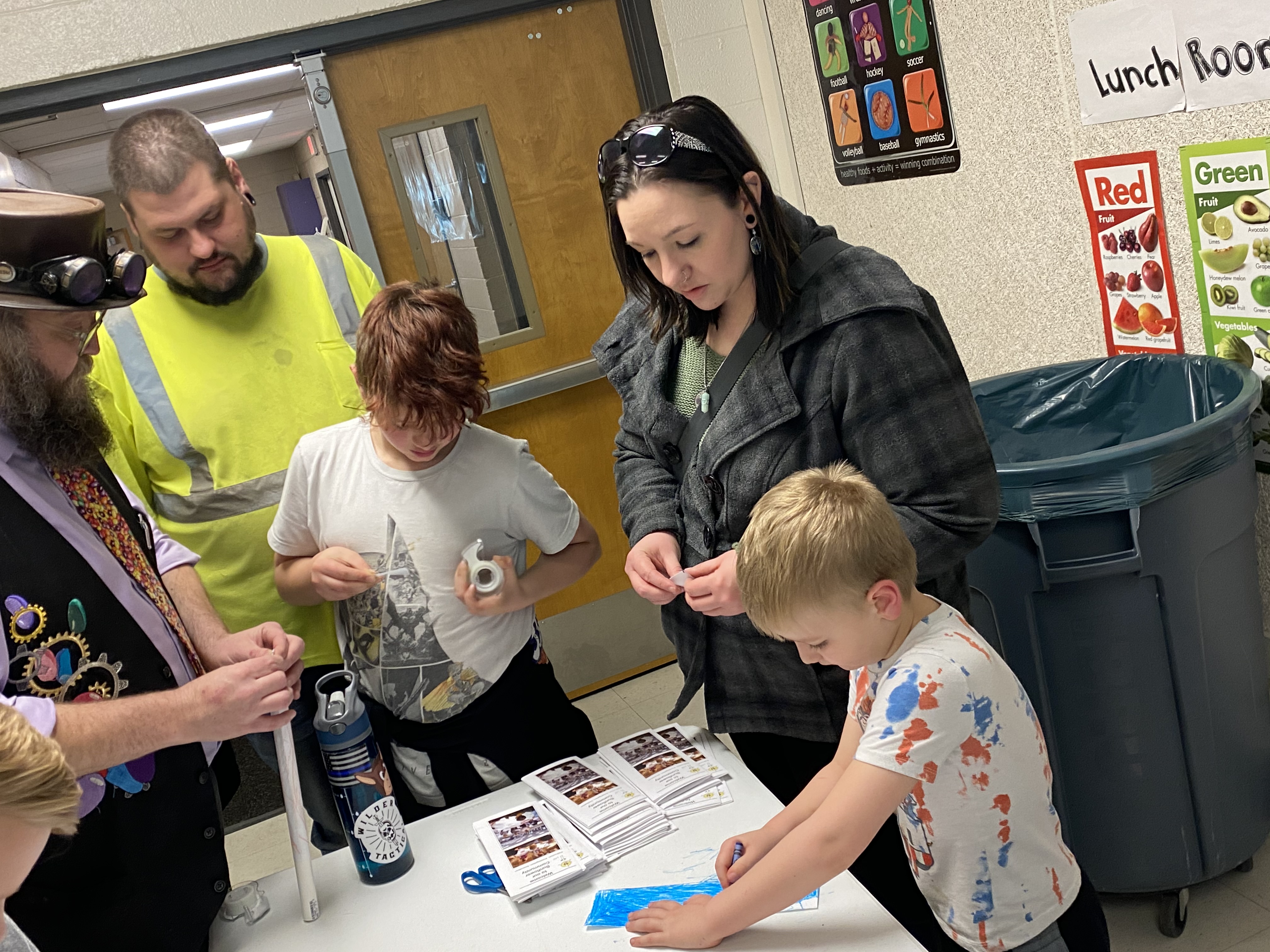 Children and family members work together at a Gel E. Bean STEAMteam activity