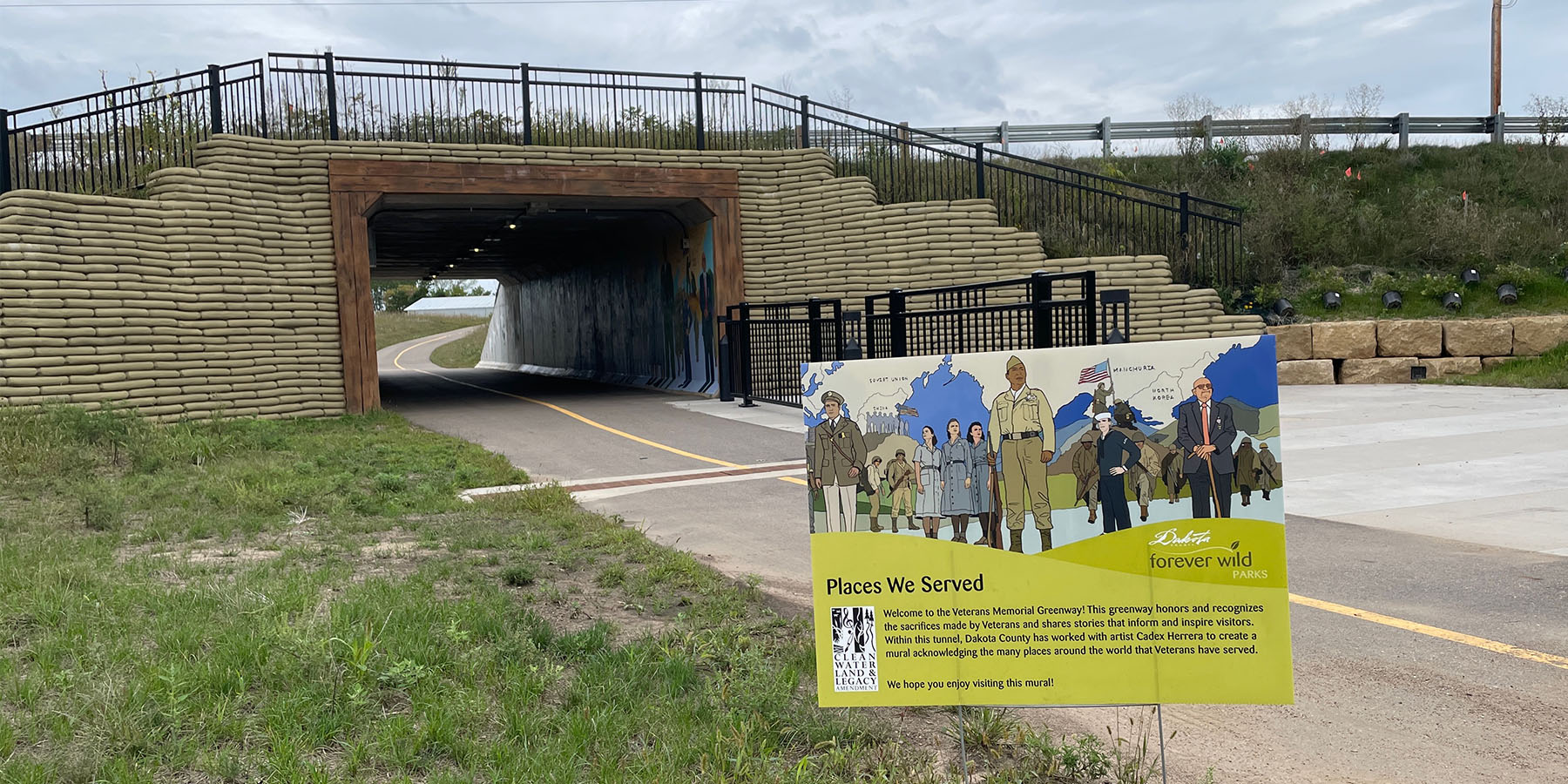 Veterans Memorial Greenway mural and sign