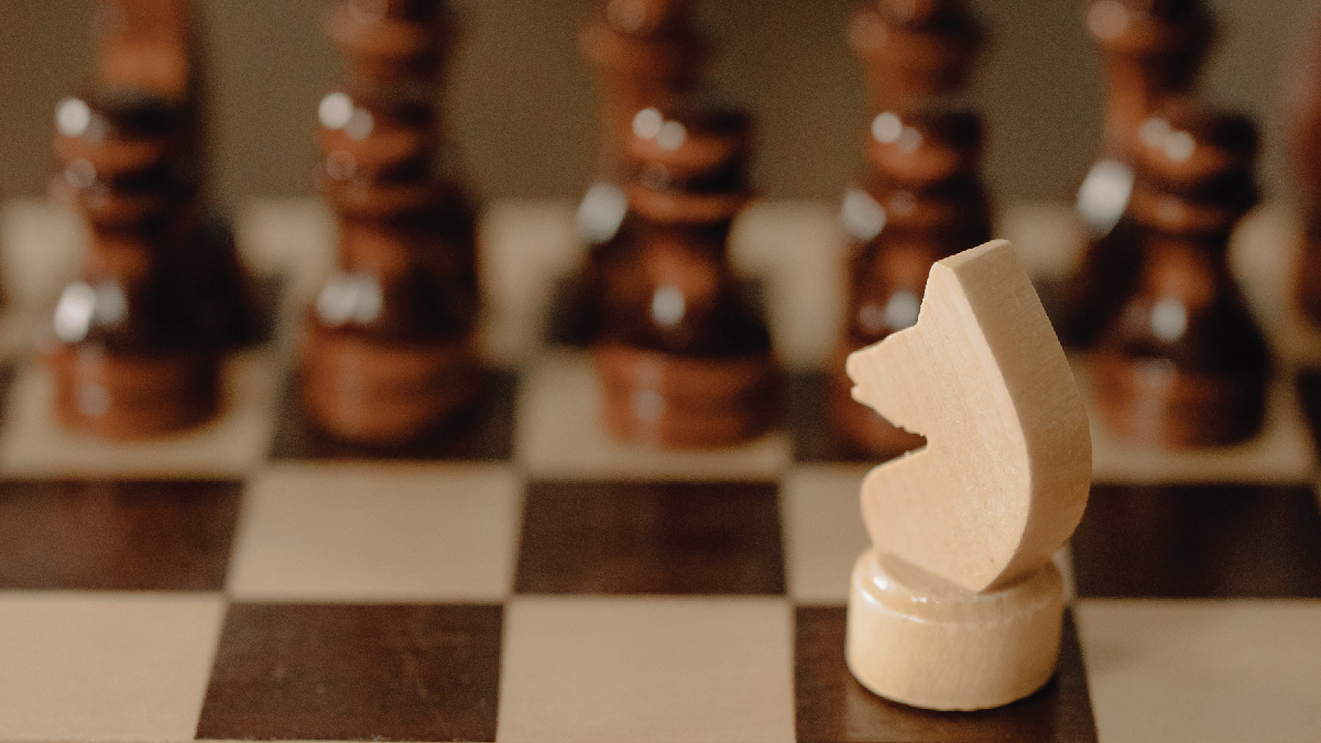 Wewa Films | Chess board with wooden pieces