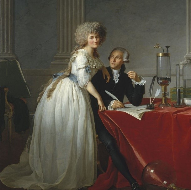 Couple in elegant attire with scientific instruments.